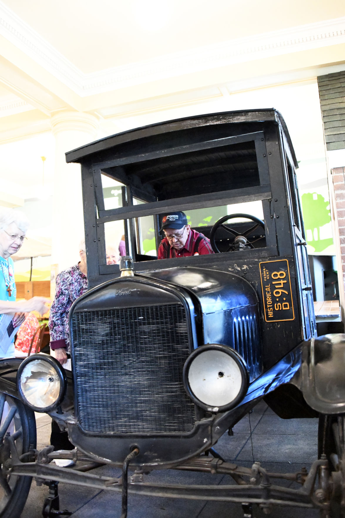 084 Glen Bower in the vintage truck at the Mead Museum in Yankton.JPG